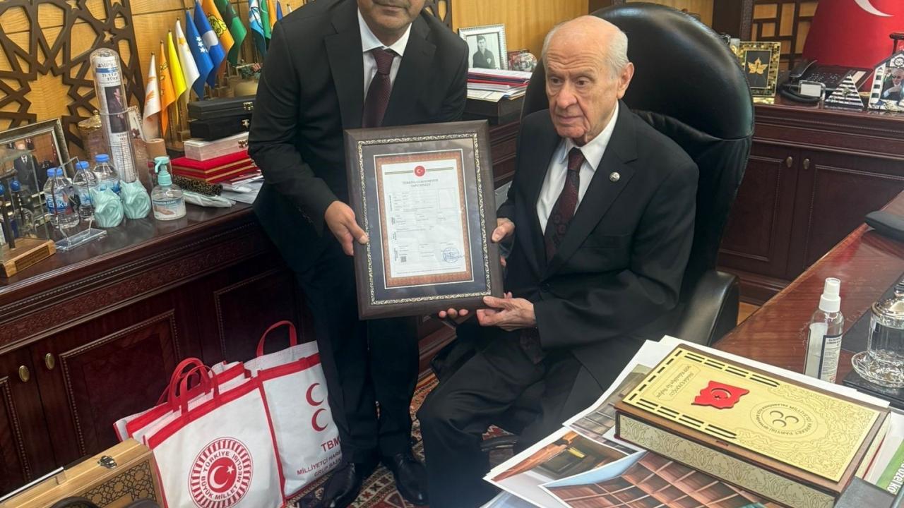 teskilat binasinin tapusunu genel baskan devlet bahceliye takdim ettiler jaSBP3VO